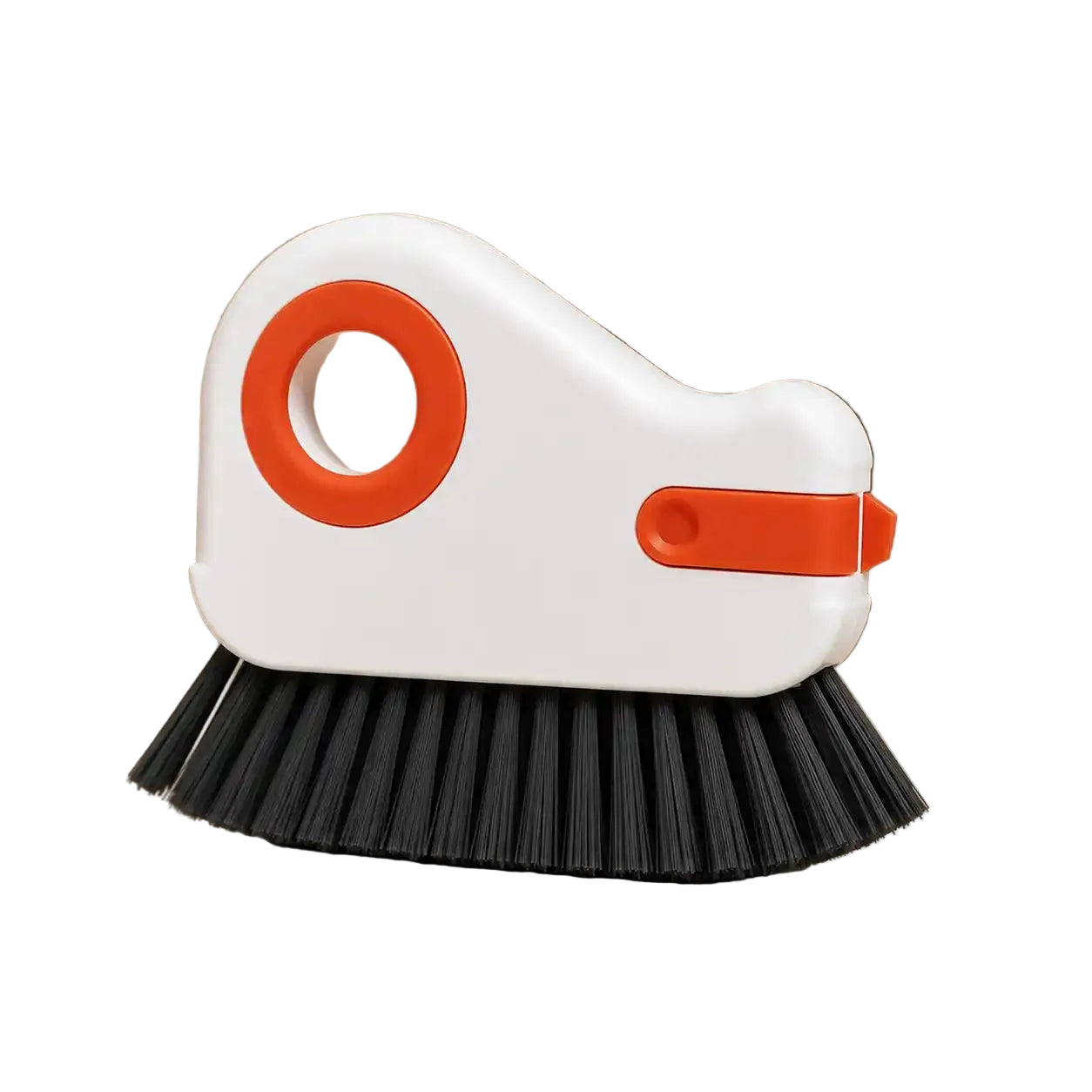 Orange red groove cleaning brush with white PP body, durable black pig bristles, and built-in scraper, shown on a warm neutral background for cleaning window tracks, sliding door grooves, kitchen corners, bathroom crevices, and other narrow household spaces.