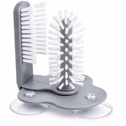 Studio image of a grey 2-in-1 suction cup glass and bottle cleaning brush with white nylon bristles, removable center brush, side brush, and three suction cups on a white background.